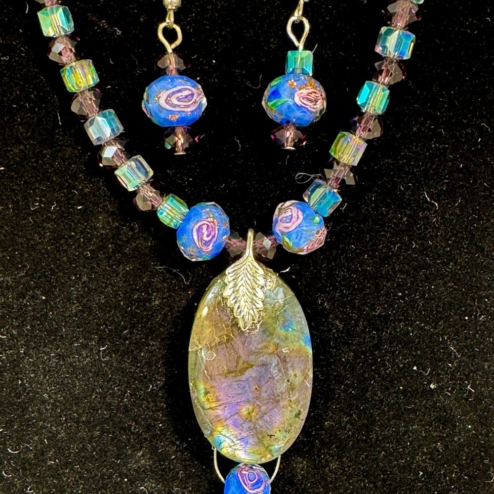 Elegant multi flash Labradorite pendant and blown glass bead necklace.